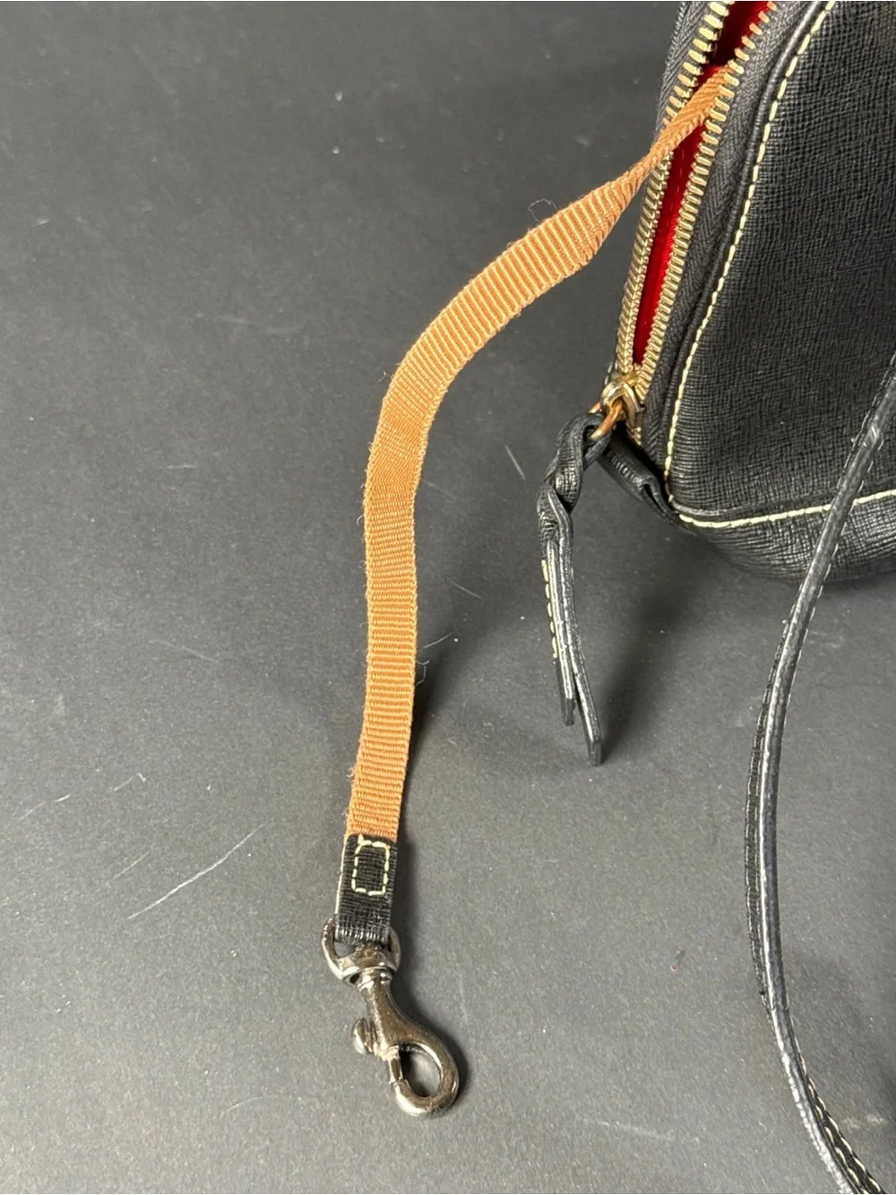 Dooney & Bourke Saffiano Leather Black Handbag with Gold Plaque